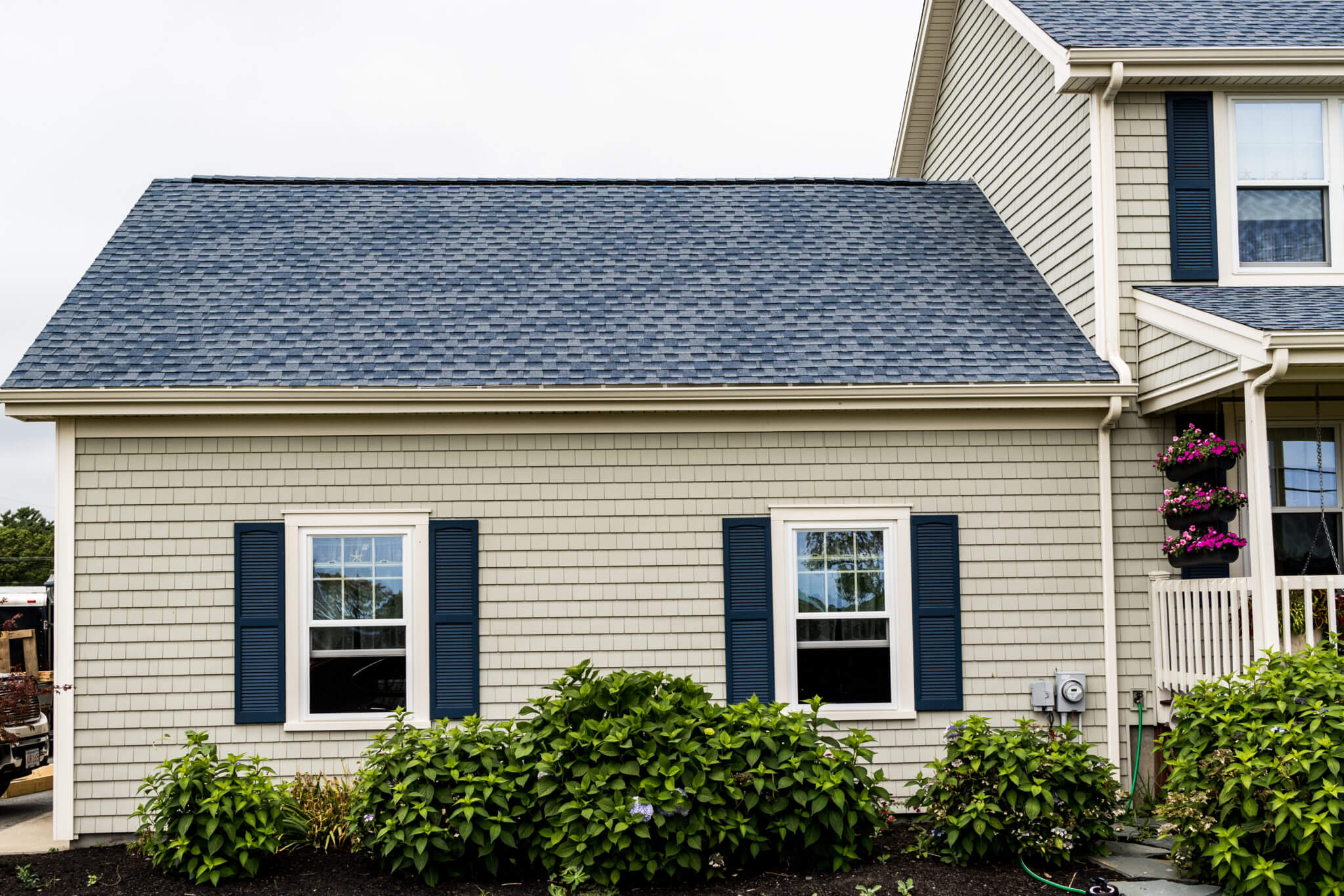House with new vinyl siding replacement roof windows House with new vinyl siding, replacement roof & windows in MA by Marshall Building & Remodeling