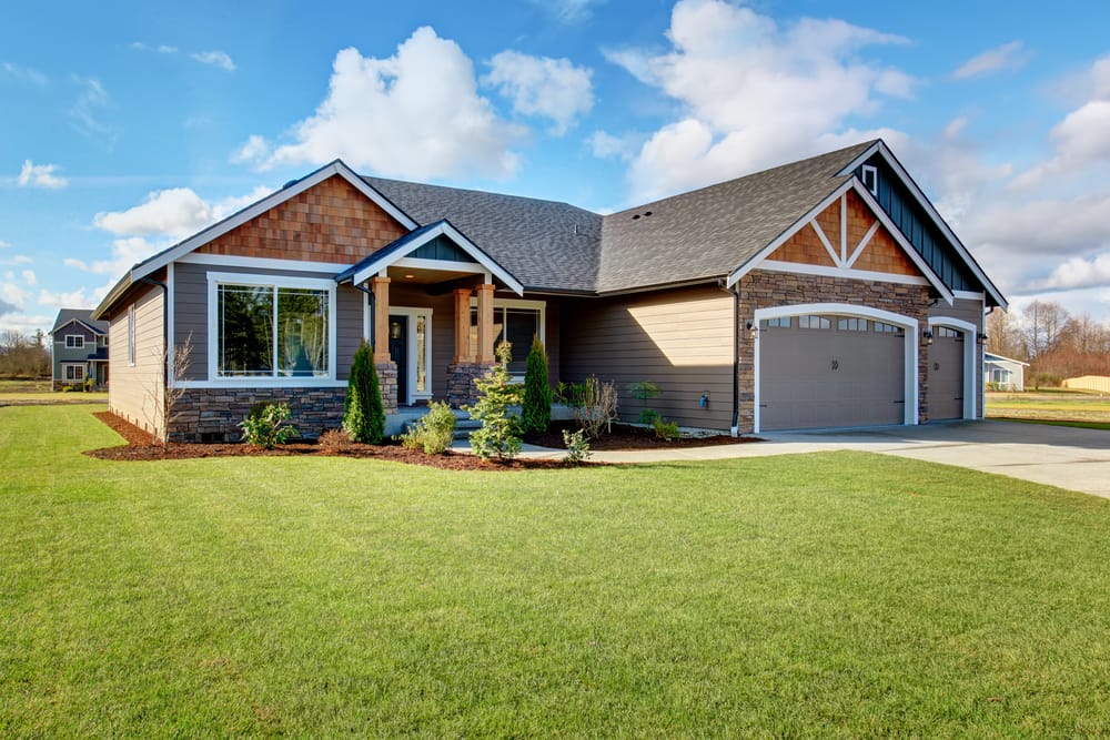 Large modern house with stone and walkway