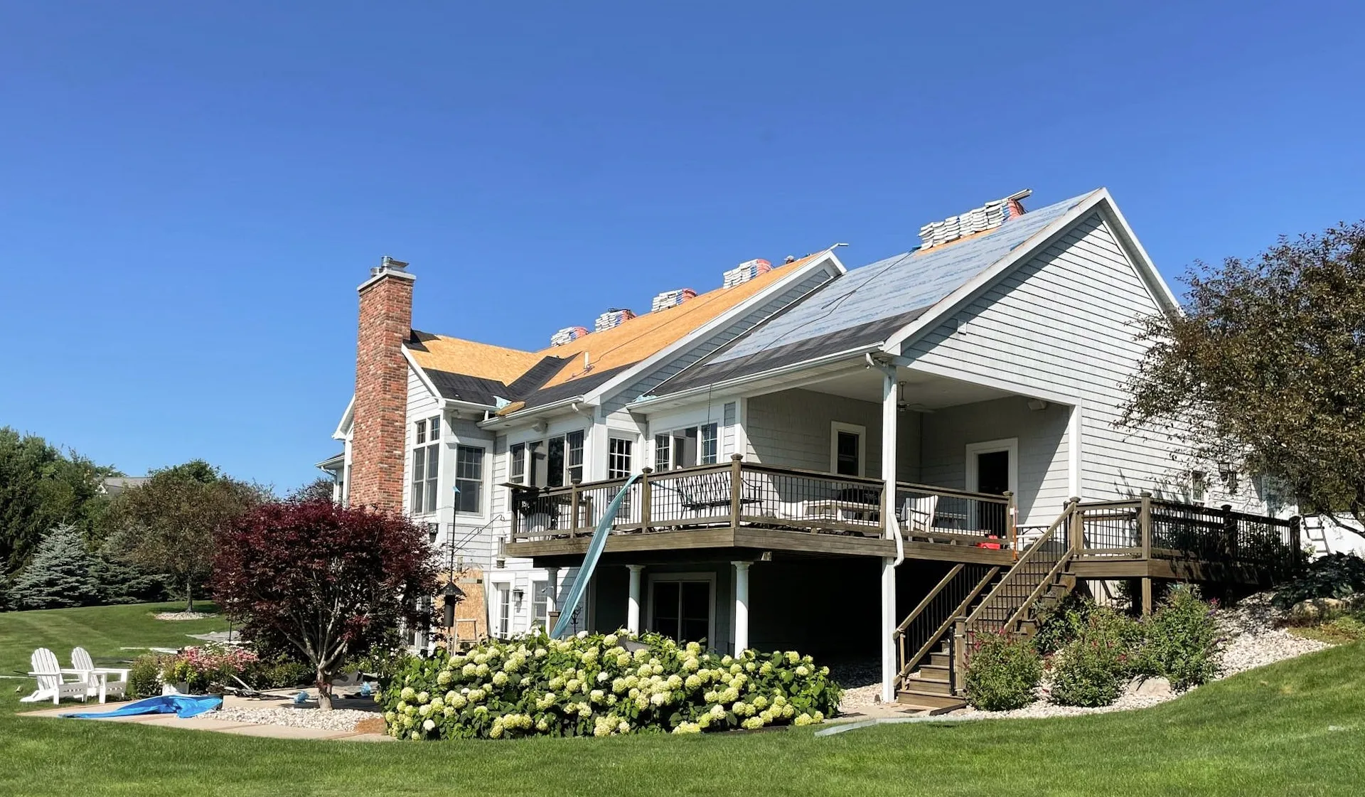 home with new roof being installed